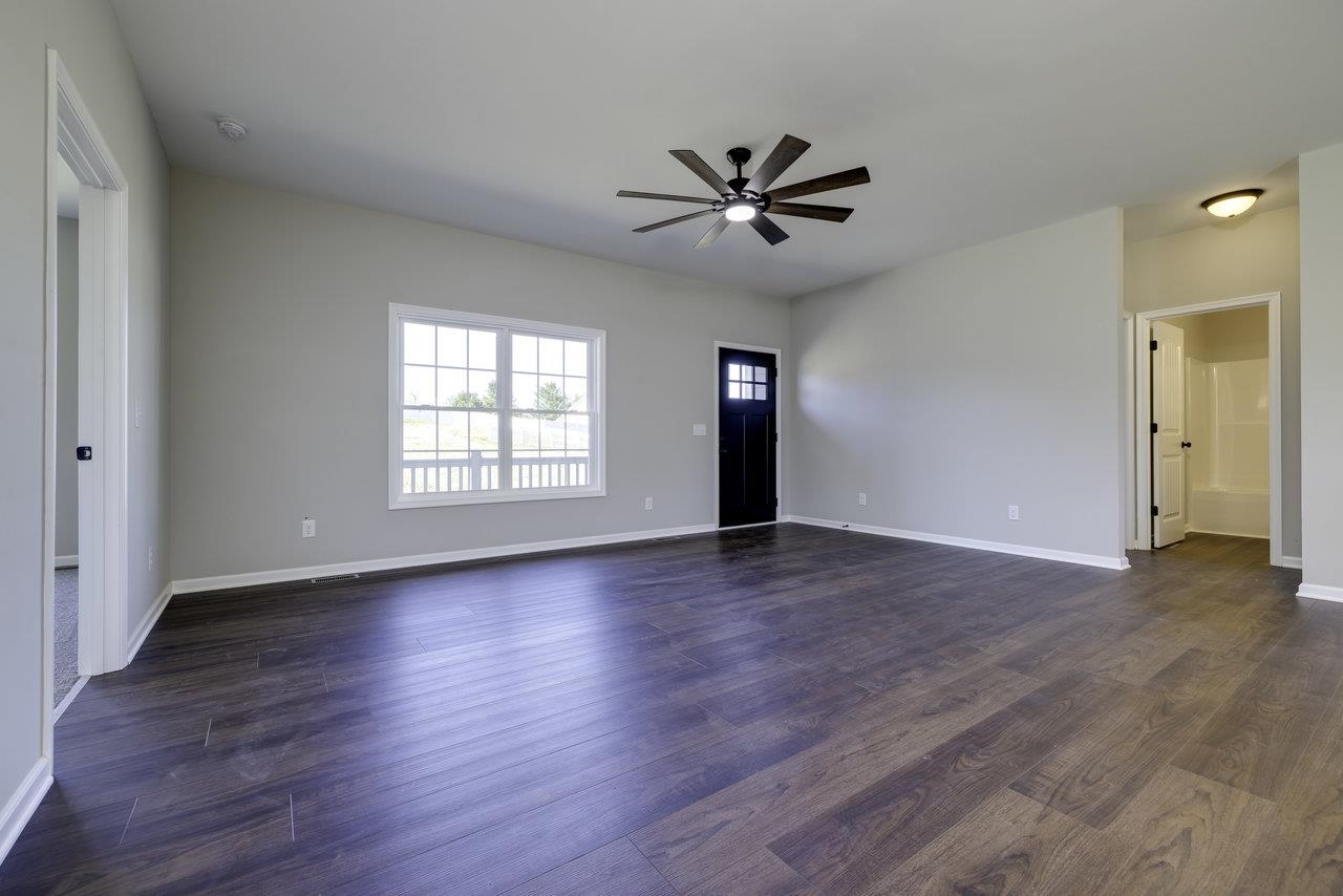 85 Springridge Lane Fairfield, VA 24435 - Photo 20 of 54 a view of an empty room with wooden floor and a window