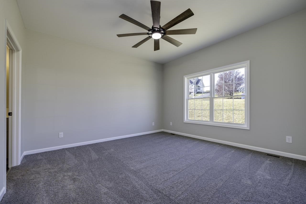 85 Springridge Lane Fairfield, VA 24435 - Photo 25 of 54 an empty room with a window and a fan