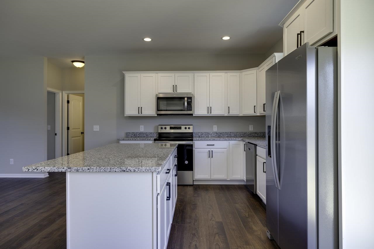 85 Springridge Lane Fairfield, VA 24435 - Photo 5 of 54 a kitchen with stainless steel appliances granite countertop a refrigerator sink and stove