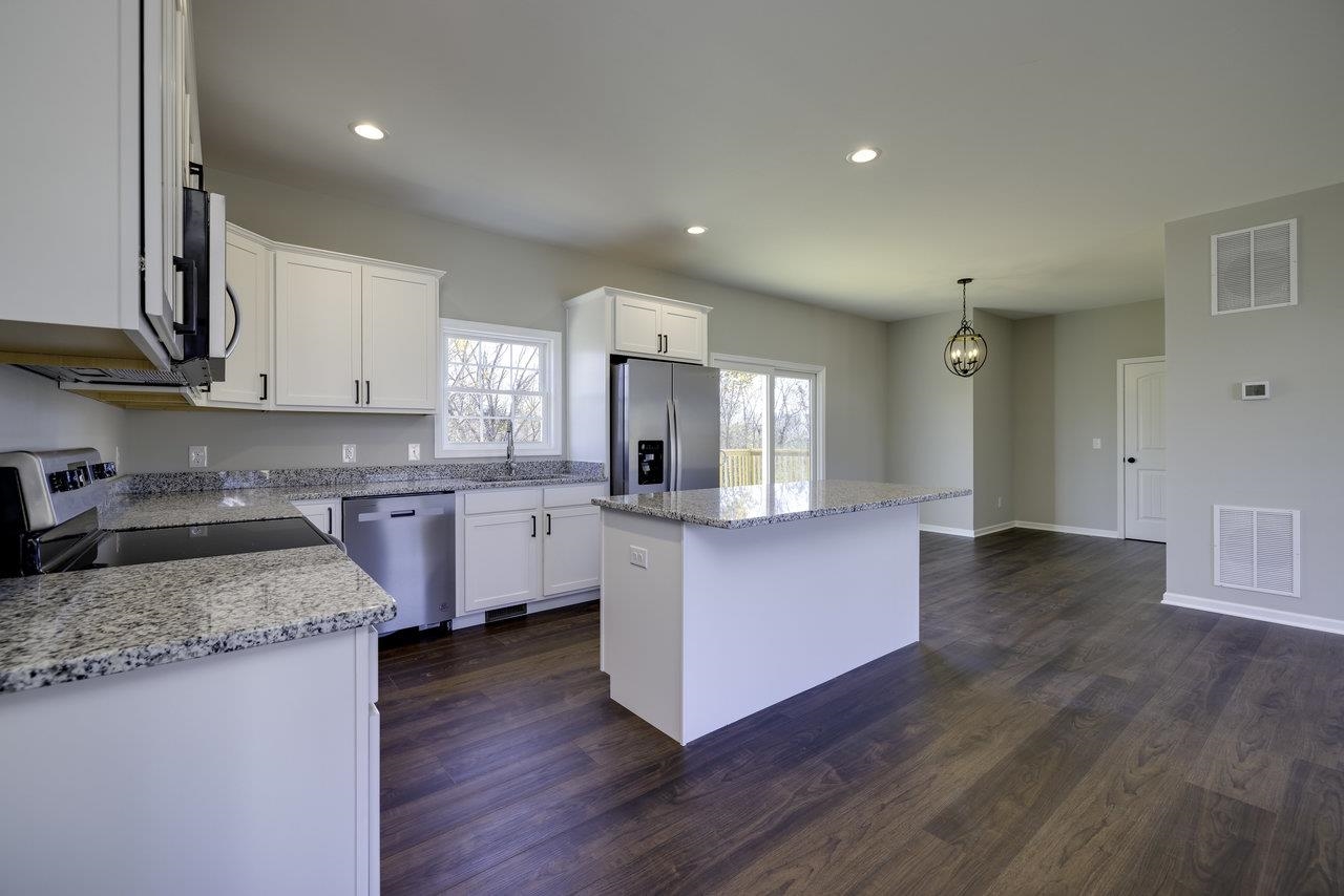 85 Springridge Lane Fairfield, VA 24435 - Photo 7 of 54 a large kitchen with stainless steel appliances granite countertop a white cabinets a sink a stove a refrigerator and island