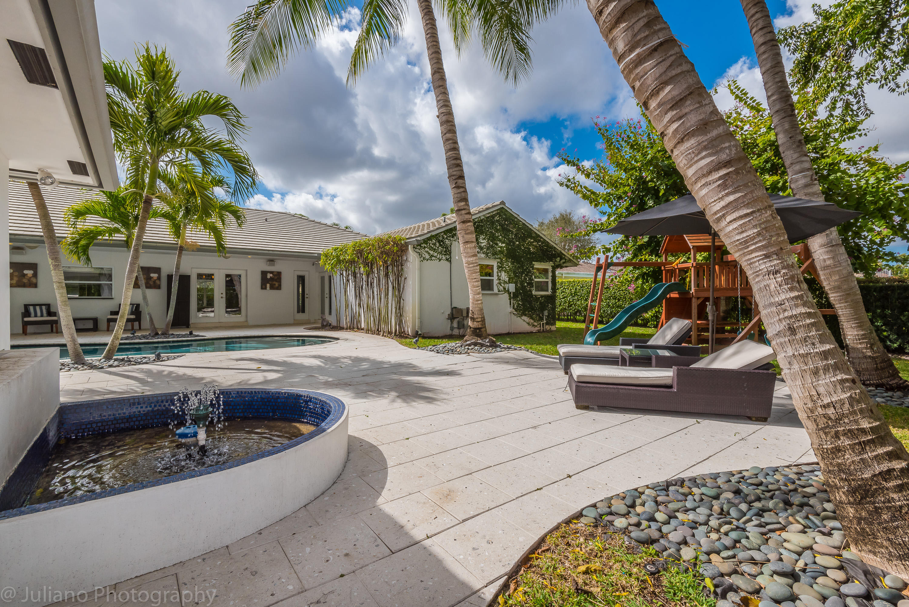 6813 Giralda Circle Boca Raton, FL 33433 - Photo 6 of 36 Backyard Fountain Area