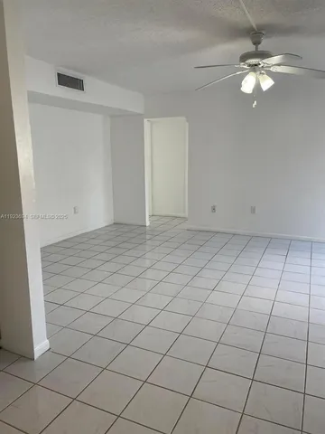 a view of outdoor space with signage and flags