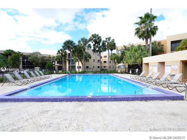a view of a golf course with a lake