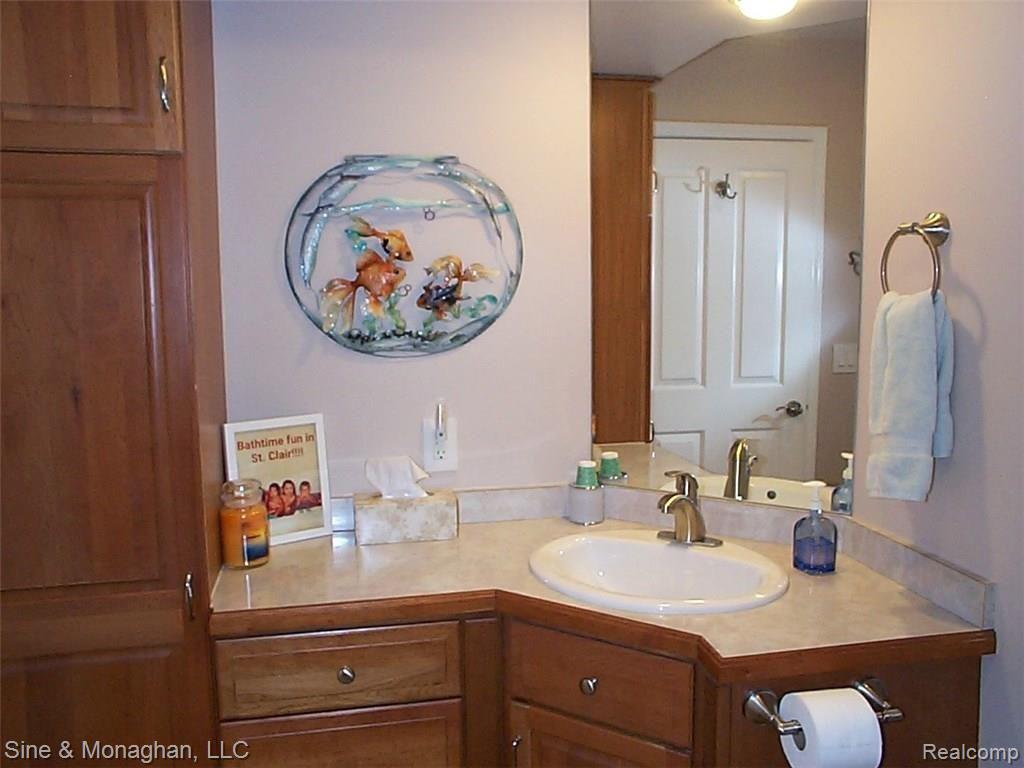 1055 River Road St. Clair, MI 48079 - Photo 72 of 88 72 GUEST BATH 2 VANITY 3 1055 RIVER RD.