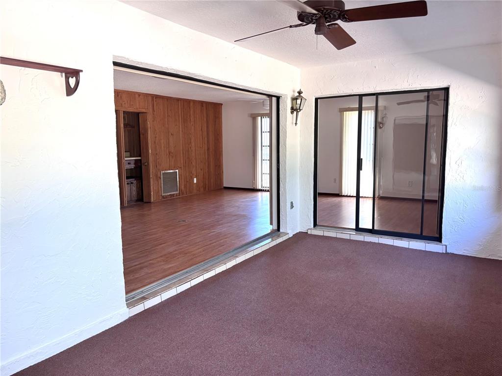 324 Alemander Avenue DeBary, FL 32713 - Photo 28 of 40 a view of a livingroom with a ceiling fan and window