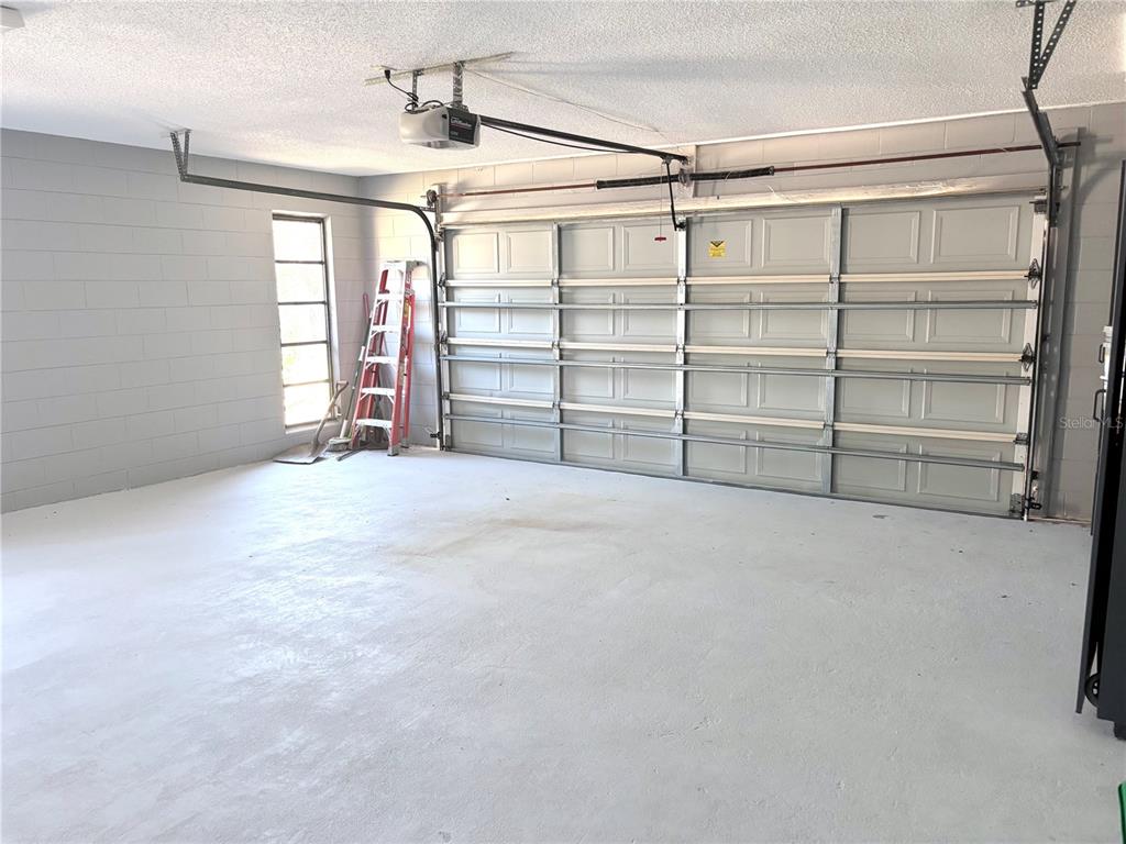324 Alemander Avenue DeBary, FL 32713 - Photo 32 of 40 a view of a room with storage and utility