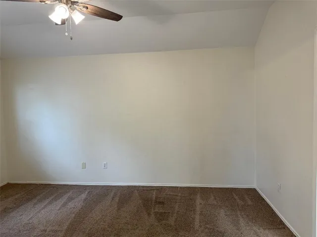 a bathroom with a tub and shower