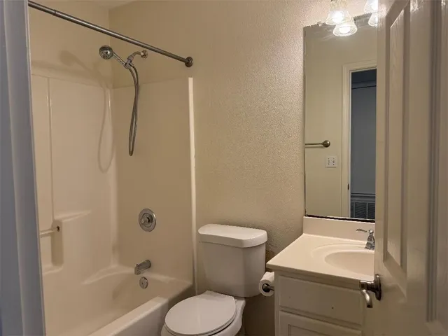 a house with trees in the background