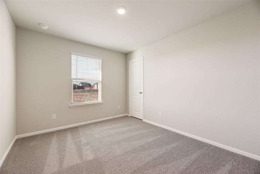 14127 Bacton Road Pilot Point, TX 76258 - Photo 4 of 18 an empty room with a window