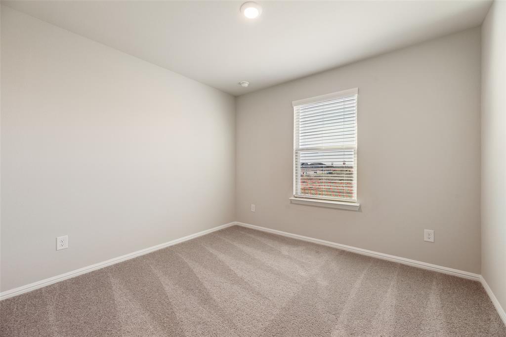 14127 Bacton Road Pilot Point, TX 76258 - Photo 9 of 18 an empty room with a window