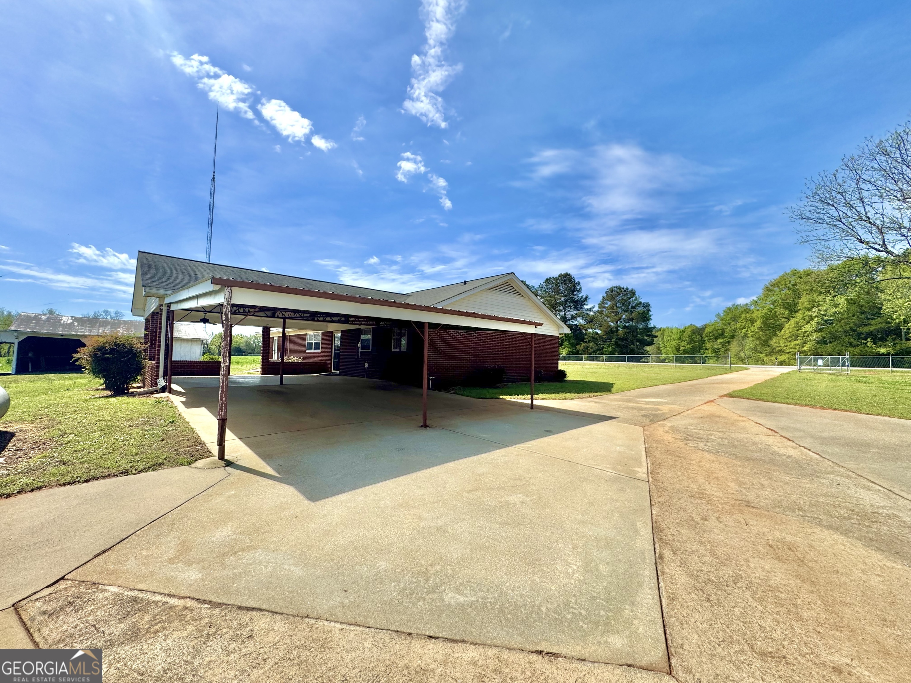 1760 Fears Road Rutledge, GA 30663 - Photo 35 of 68 a view of a swimming pool with a patio