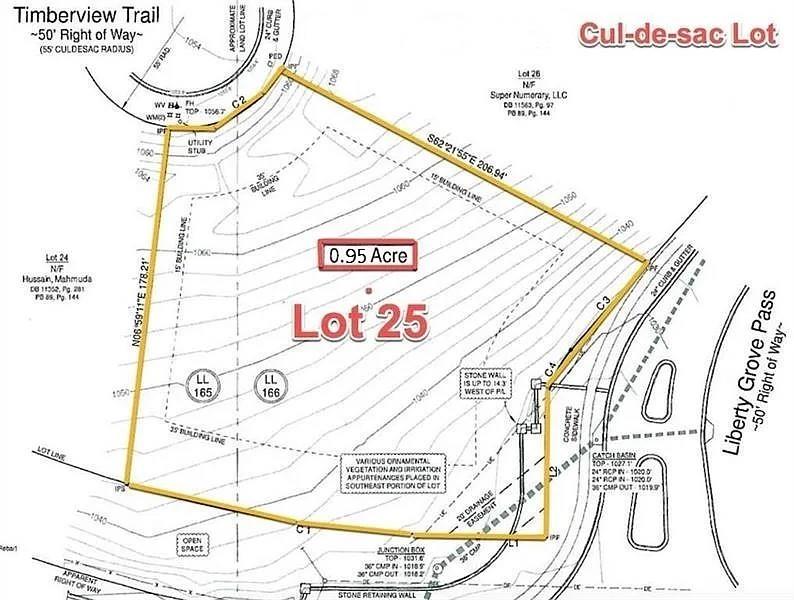 307 Timberview Trail Alpharetta, GA 30004 - Photo 2 of 12 a sign on a wall next to a building