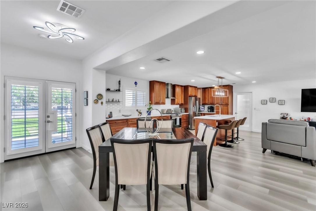 8460 West Ann Road Las Vegas, NV 89149 - Photo 58 of 74 Second Home Dining Area with Backyard Access through French Doors