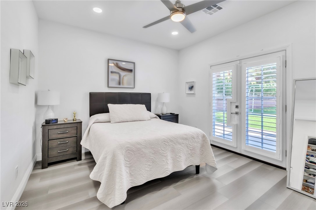 8460 West Ann Road Las Vegas, NV 89149 - Photo 60 of 74 Second Home Primary Bedroom with Backyard Access through French Doors