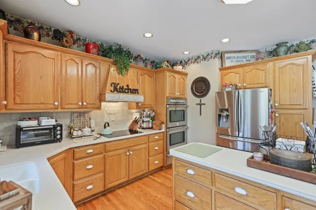 a bathroom with a tub shower and sink