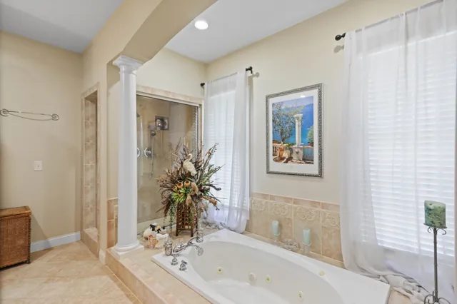 a bed room with furniture and decor