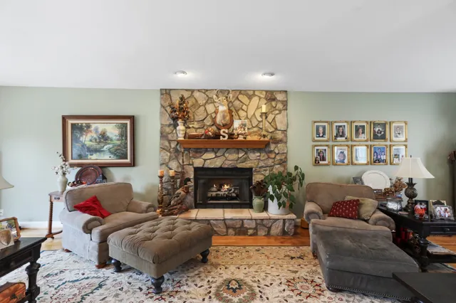 a bedroom with furniture and a chandelier