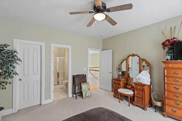 a view of a swimming pool with a yard