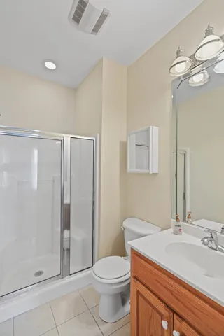 a view of a swimming pool with an outdoor space and seating area