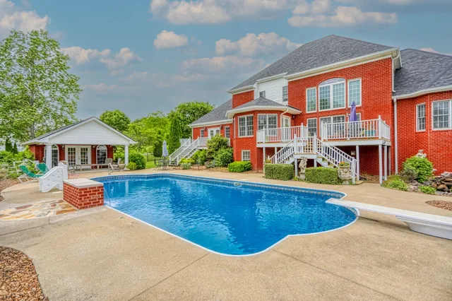 a view of a table and chairs in the patio