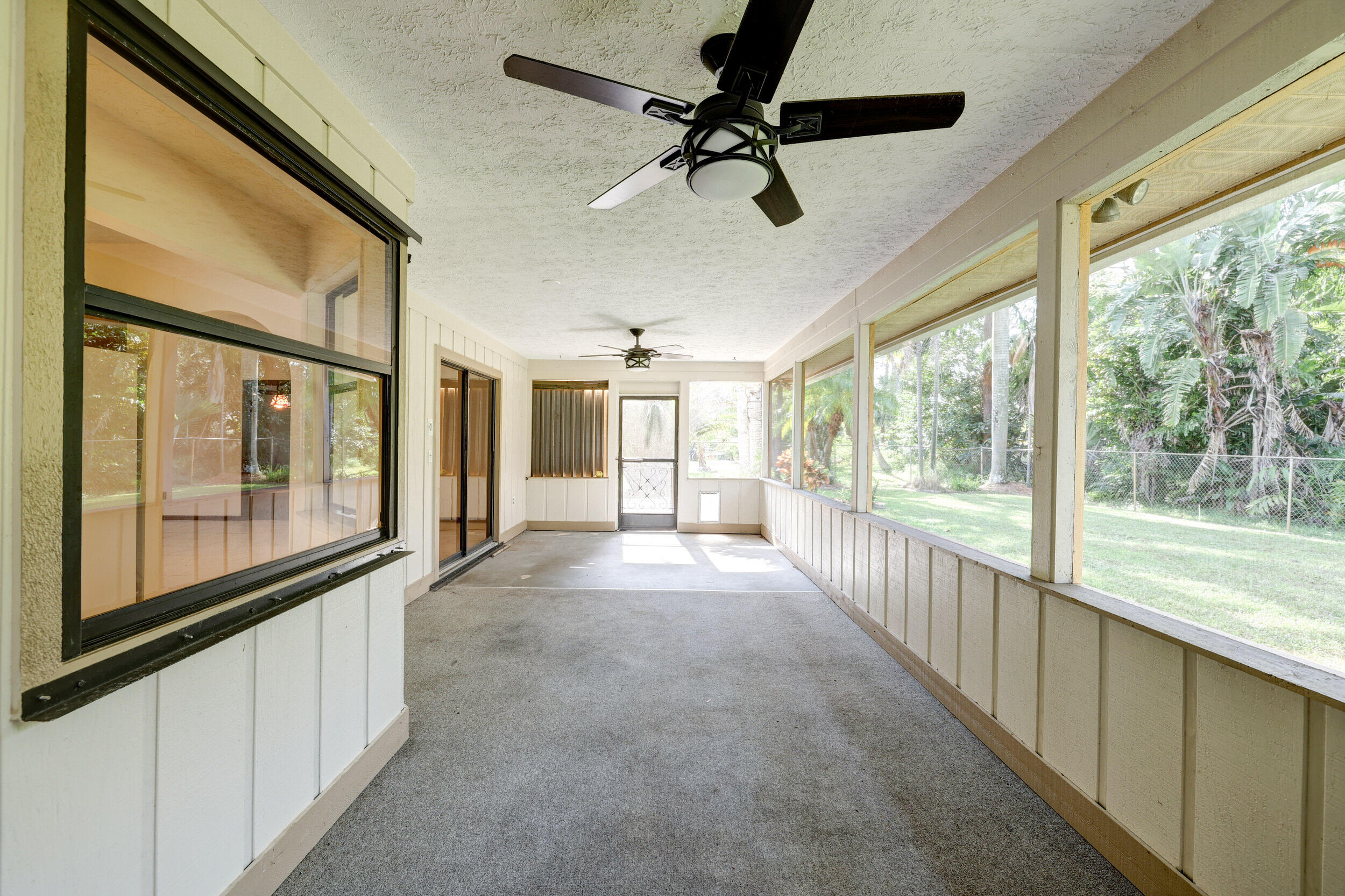 2630 Southwest Ace Road Port St. Lucie, FL 34953 - Photo 24 of 31 COVERED SCREENED PATIO