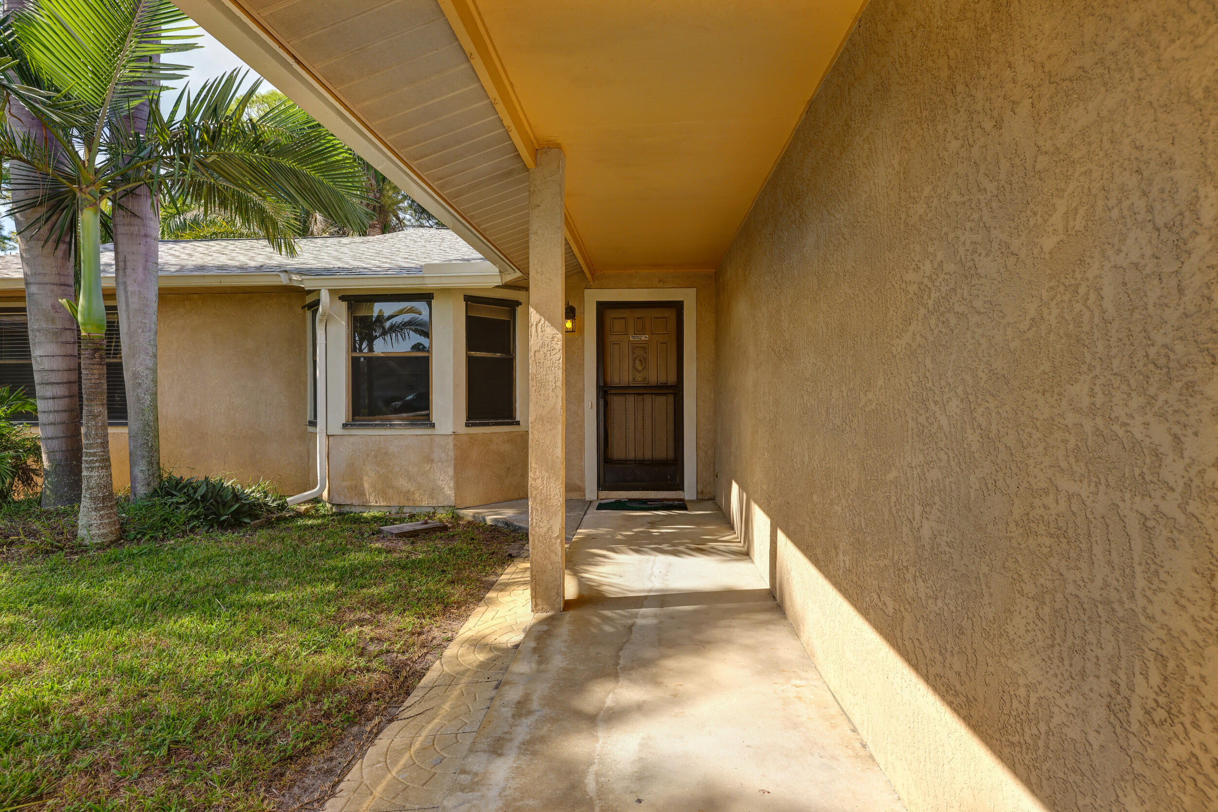 2630 Southwest Ace Road Port St. Lucie, FL 34953 - Photo 3 of 31 FRONT COVERED PORCH