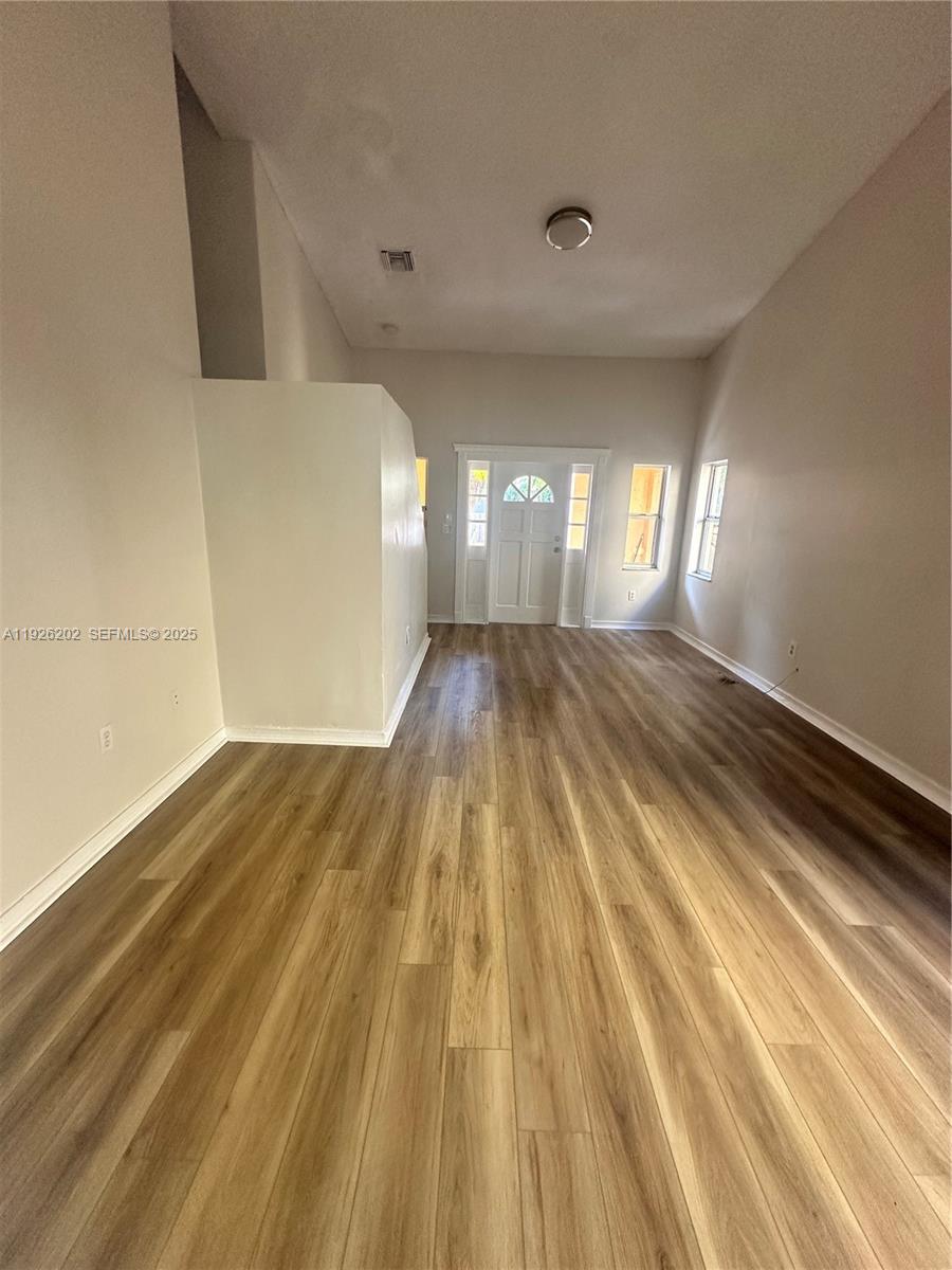 27347 Southwest 117th Place Homestead, FL 33032 - Photo 17 of 37 a view of empty room