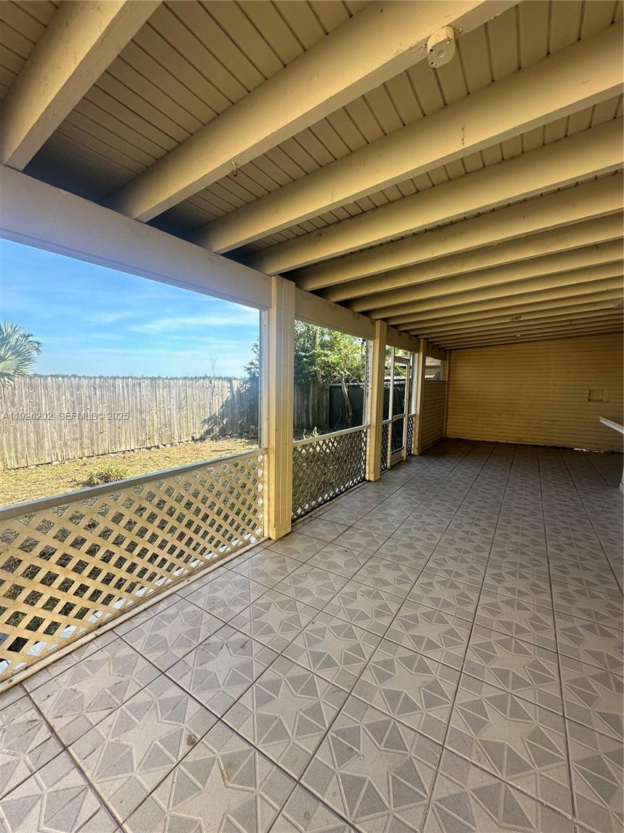 27347 Southwest 117th Place Homestead, FL 33032 - Photo 34 of 37 a view of a porch