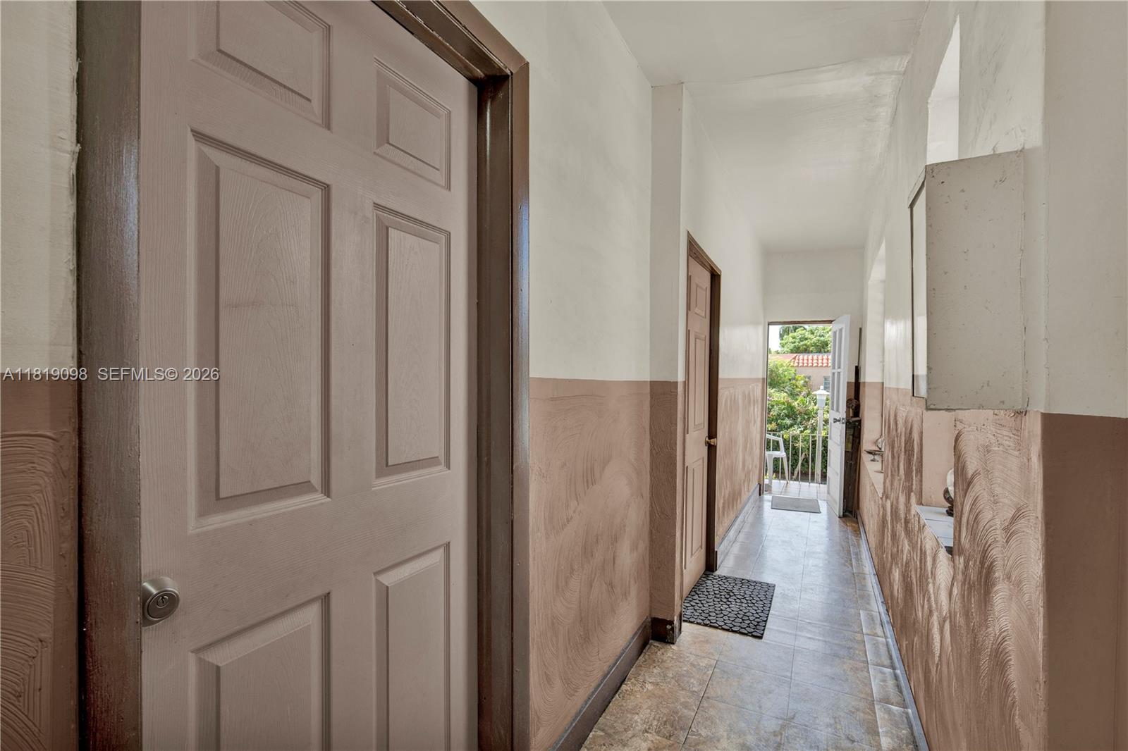 829 Southwest 19th Avenue Miami, FL 33135 - Photo 37 of 54 a view of a hallway with wooden floor and staircase