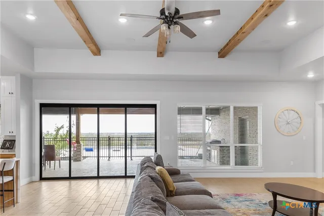 a large kitchen with stainless steel appliances kitchen island a large island in the center