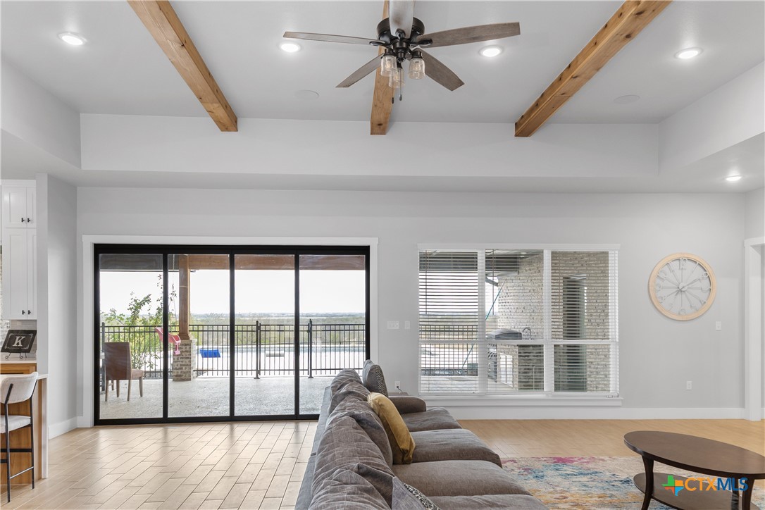 13428 Knob Hill Road Rogers, TX 76569 - Photo 13 of 41 a living room with furniture and a large window