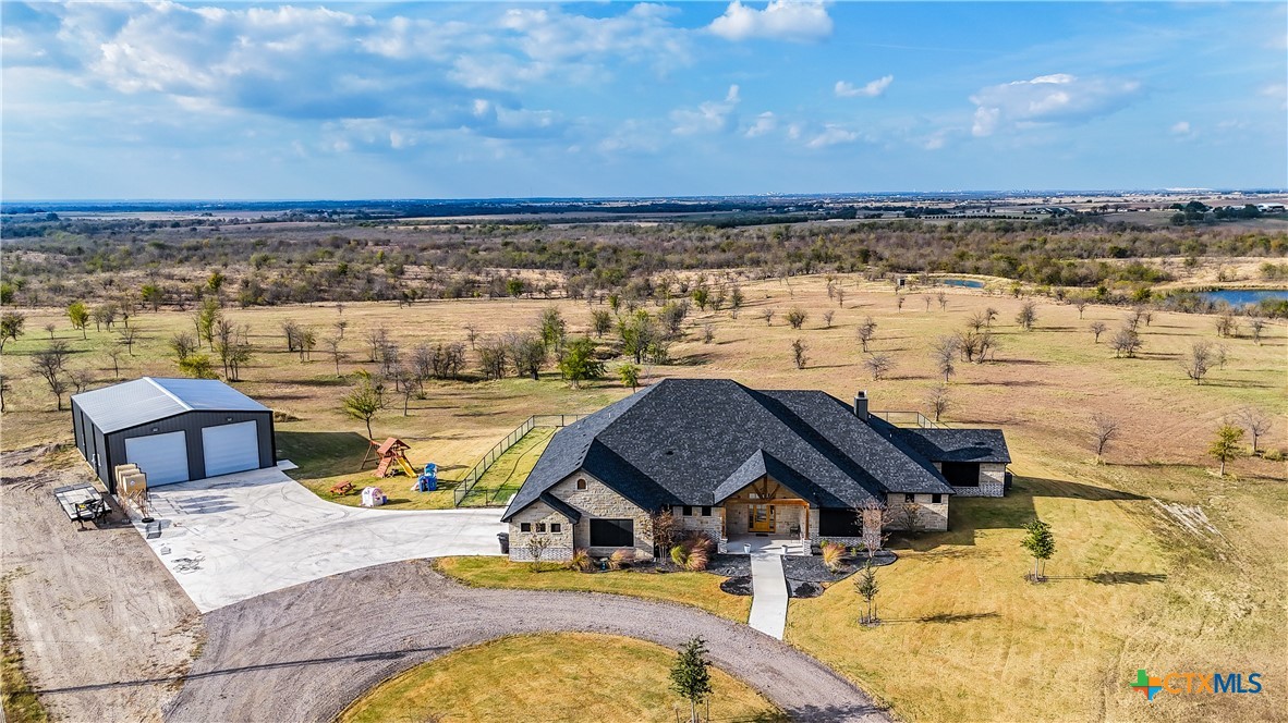 13428 Knob Hill Road Rogers, TX 76569 - Photo 33 of 41 a view of a swimming pool with an ocean view