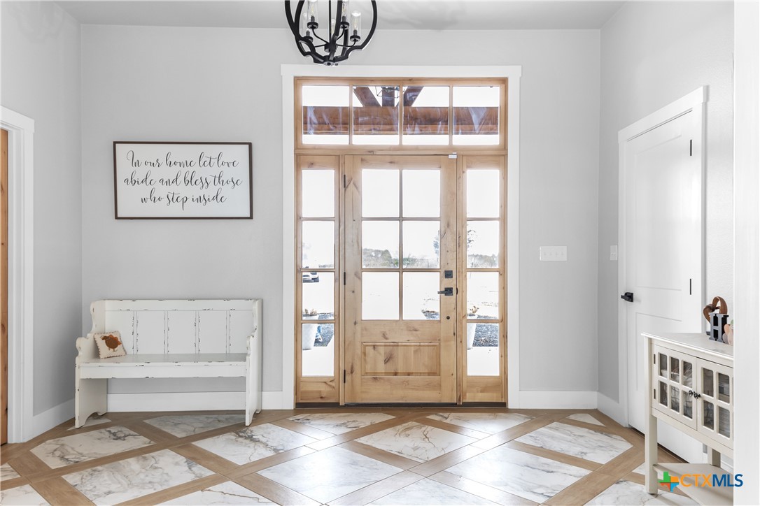 13428 Knob Hill Road Rogers, TX 76569 - Photo 8 of 41 a view of front door with furniture