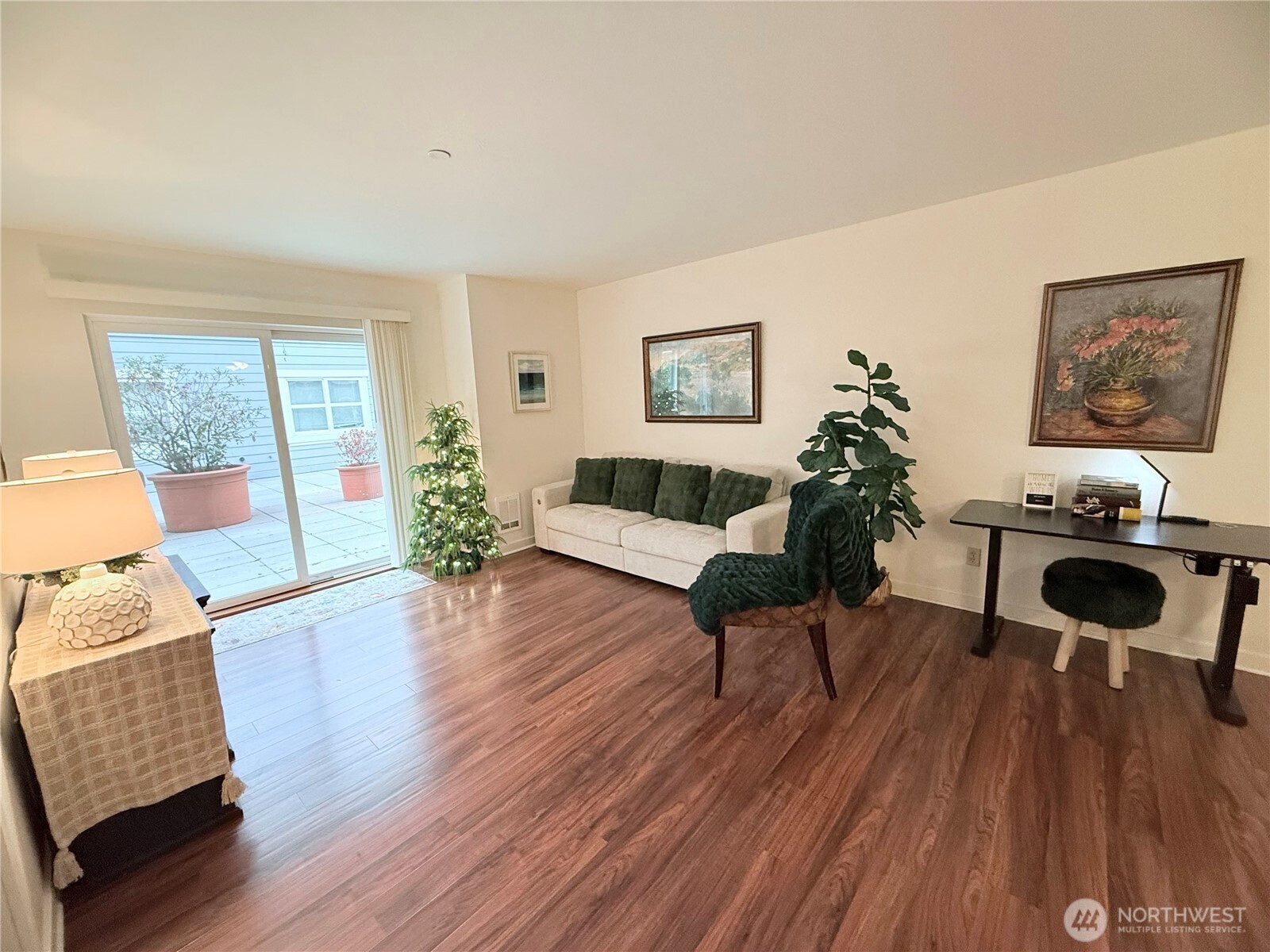 300 High School Road Northeast, Unit 203 Bainbridge Island, WA 98110 - Photo 8 of 13 a living room with furniture and a wooden floor