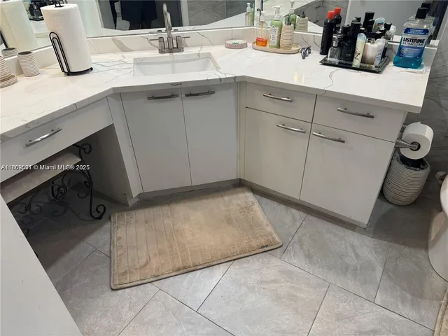 a view of a hallway with wooden floor and bedroom