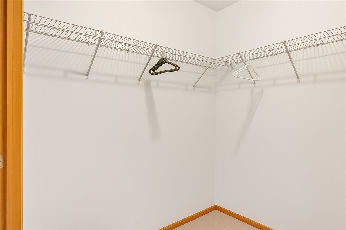 2172 Prairie Trail Round Lake Heights, IL 60073 - Photo 12 of 28 a view of a room with racks on the wall