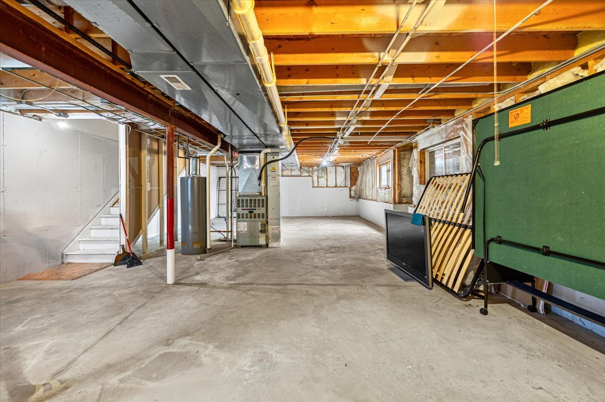 2172 Prairie Trail Round Lake Heights, IL 60073 - Photo 20 of 28 a view of an empty room with wooden walls
