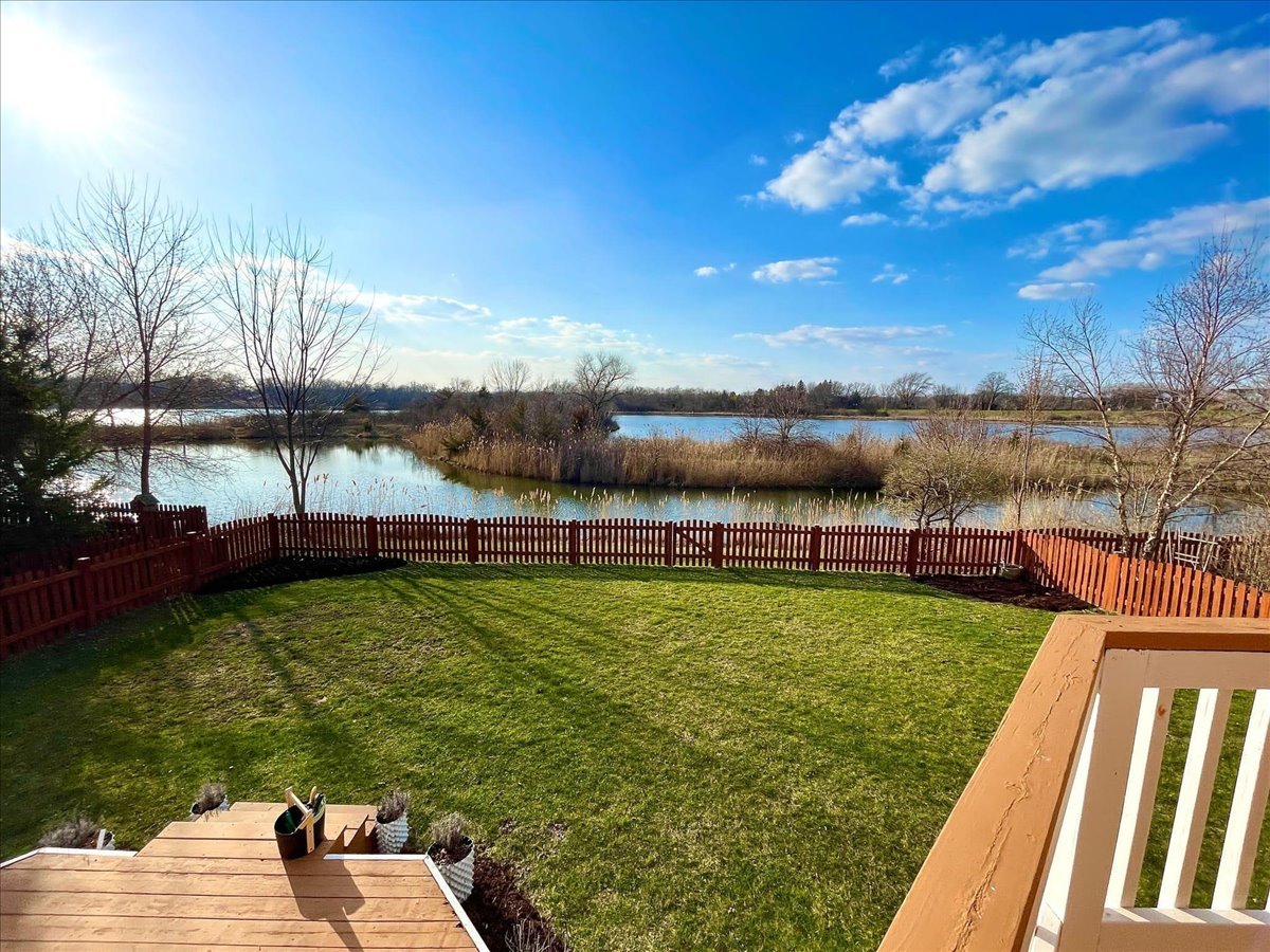 2172 Prairie Trail Round Lake Heights, IL 60073 - Photo 25 of 28 a view of a lake from a yard
