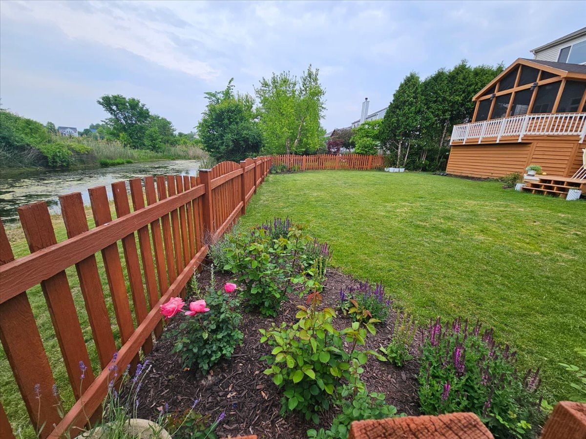 2172 Prairie Trail Round Lake Heights, IL 60073 - Photo 26 of 28 a view of a house with wooden fence