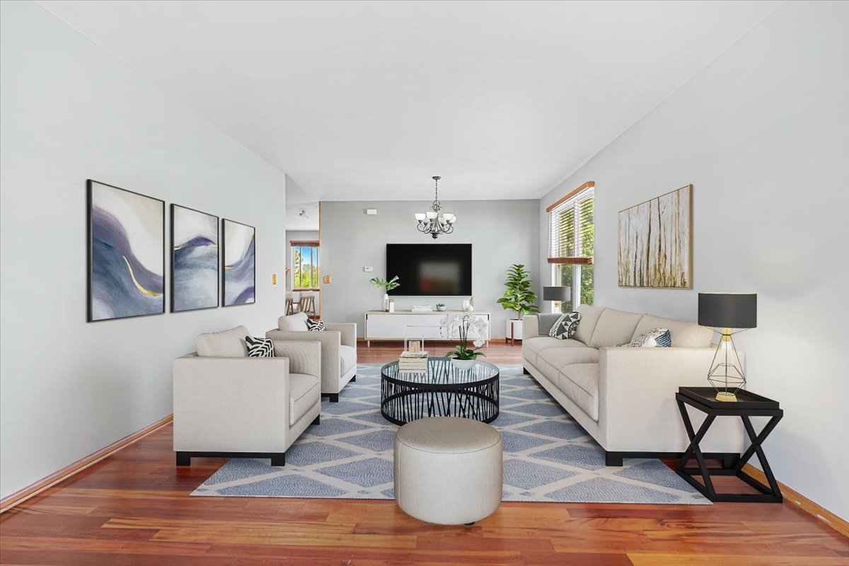 2172 Prairie Trail Round Lake Heights, IL 60073 - Photo 3 of 28 a living room with furniture and a flat screen tv