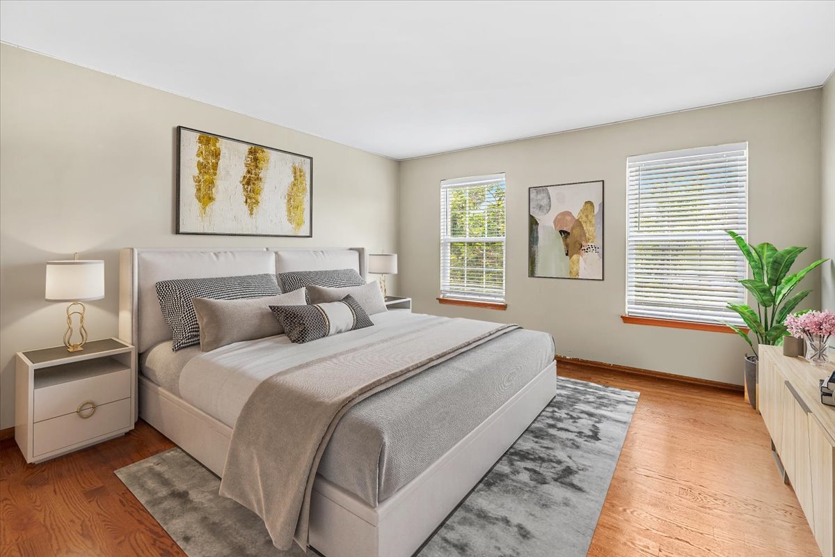 2172 Prairie Trail Round Lake Heights, IL 60073 - Photo 7 of 28 a bedroom with a large bed and a window