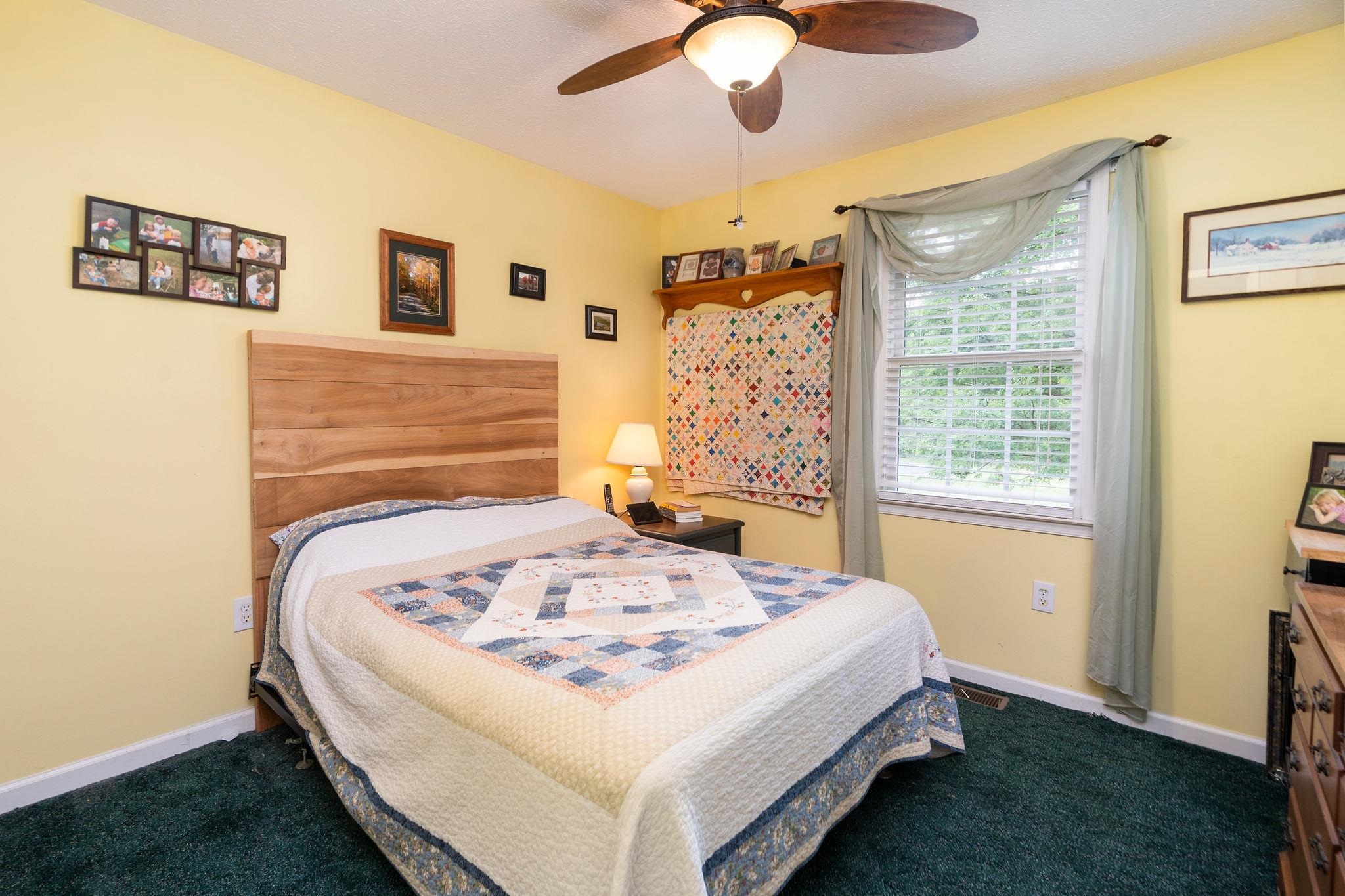 516 Estaline Valley Road Craigsville, VA 24430 - Photo 44 of 75 a bedroom with a bed and a window