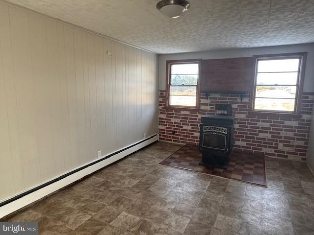 7366 River Road Westover, MD 21871 - Photo 11 of 21 Den with Pellet Stove