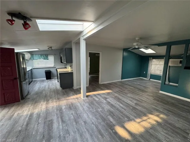 a backyard of a house with lots of green space