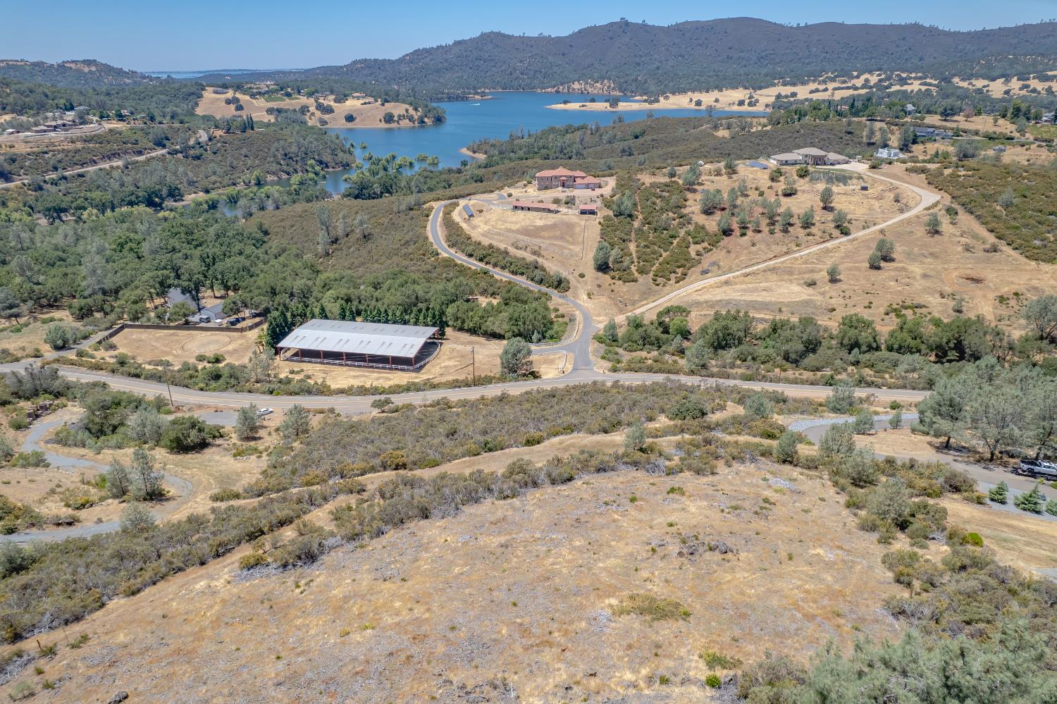 417 Salmon Falls Road El Dorado Hills, CA 95762 - Photo 2 of 47 an aerial view of residential houses with outdoor space and trees