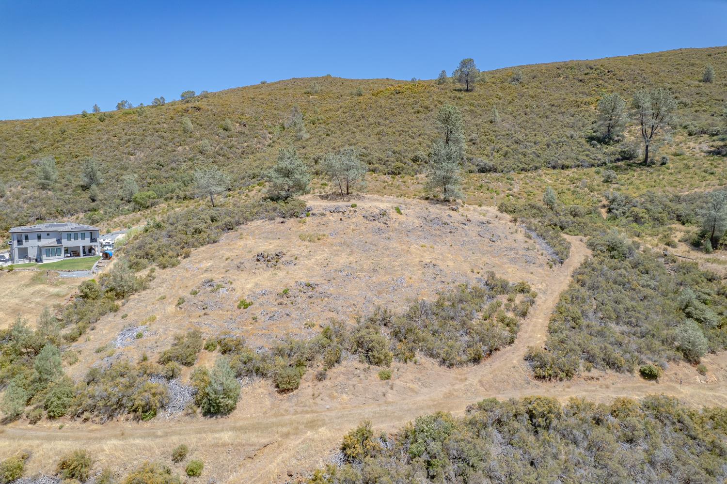 417 Salmon Falls Road El Dorado Hills, CA 95762 - Photo 6 of 47 a view of a dry field covered with snow