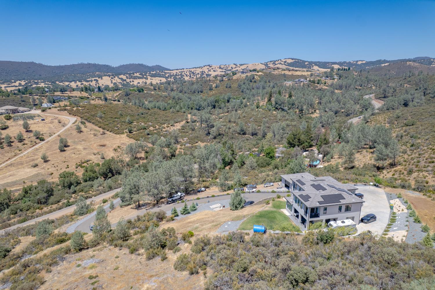 417 Salmon Falls Road El Dorado Hills, CA 95762 - Photo 7 of 47 an aerial view of residential house and sandy dunes