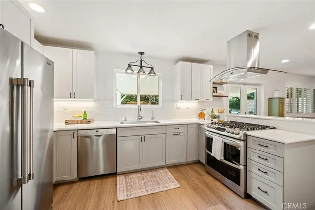 a workspace with furniture window and wooden floor