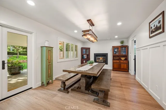 a white bath tub sitting next to a white sink