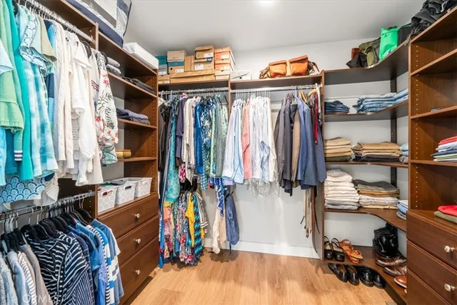 a bedroom with a bed and a desk